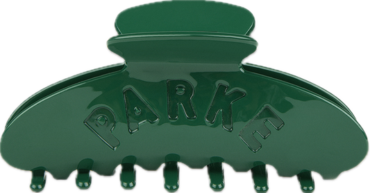 green claw clip flat lay -green